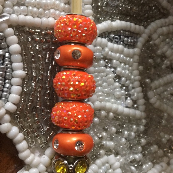 12 beads in various yellows and oranges. - Picture 2 of 5